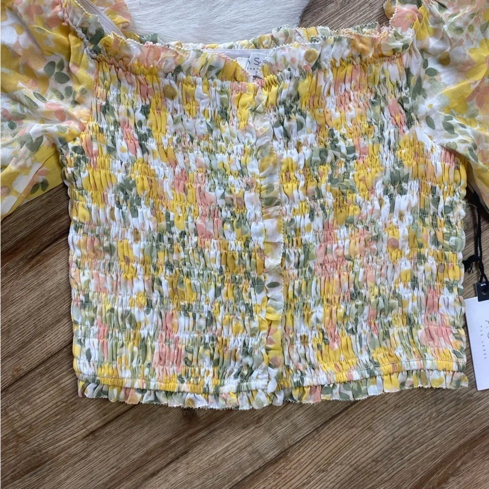 Astr the label yellow floral smocked crop top with puff sleeves.